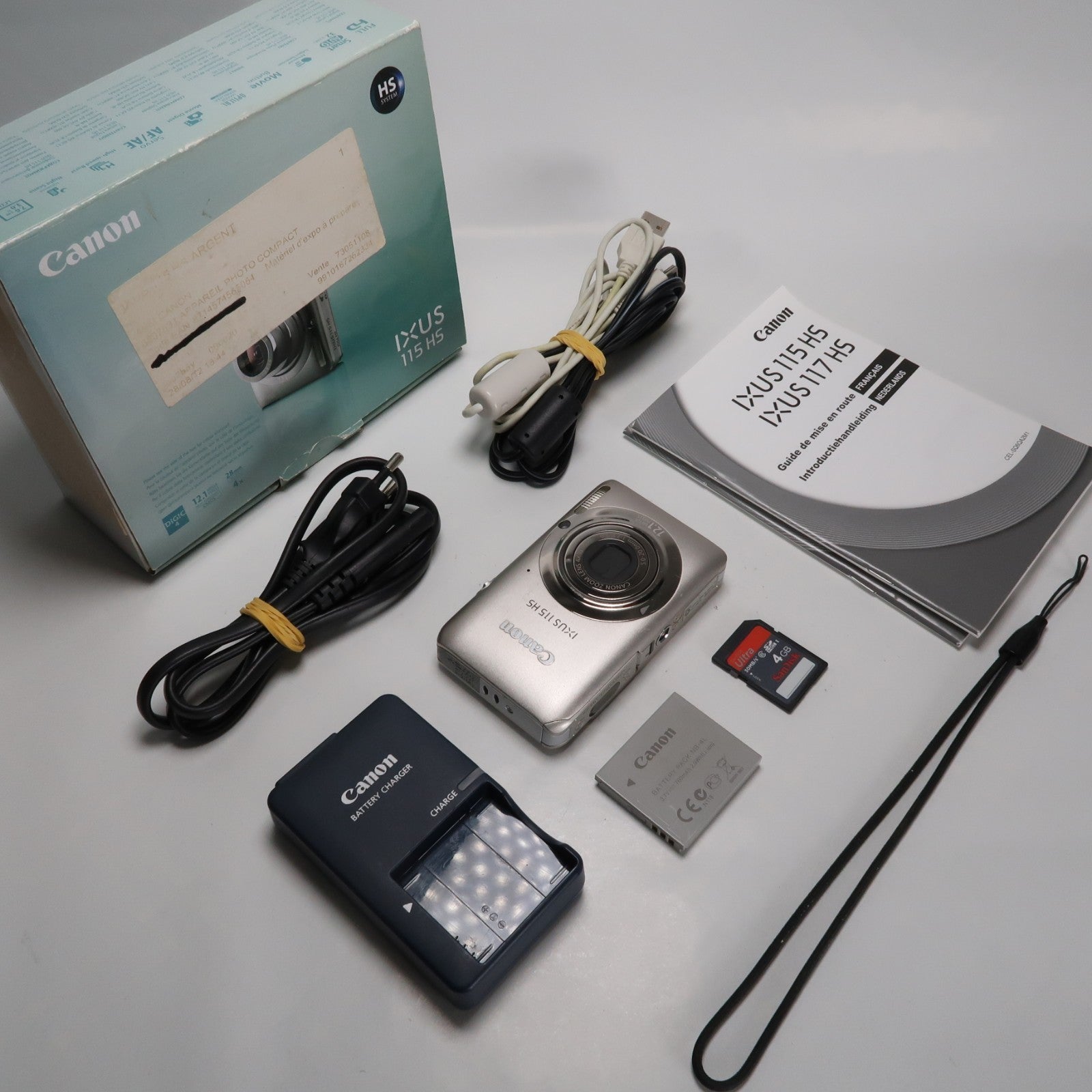 Canon IXUS 115 HS PowerShot ELPH 100 HS 12.1MP 4x Digital Camera Silver – Very Good Condition