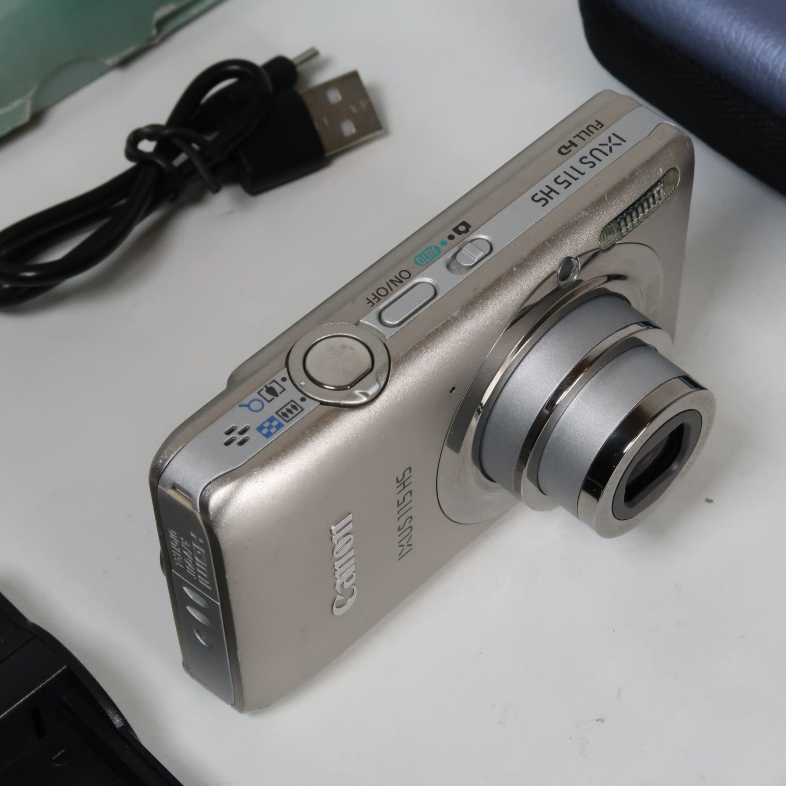 Canon IXUS 115 HS PowerShot ELPH 100 HS 12.1 MP 4x Digital Camera Silver