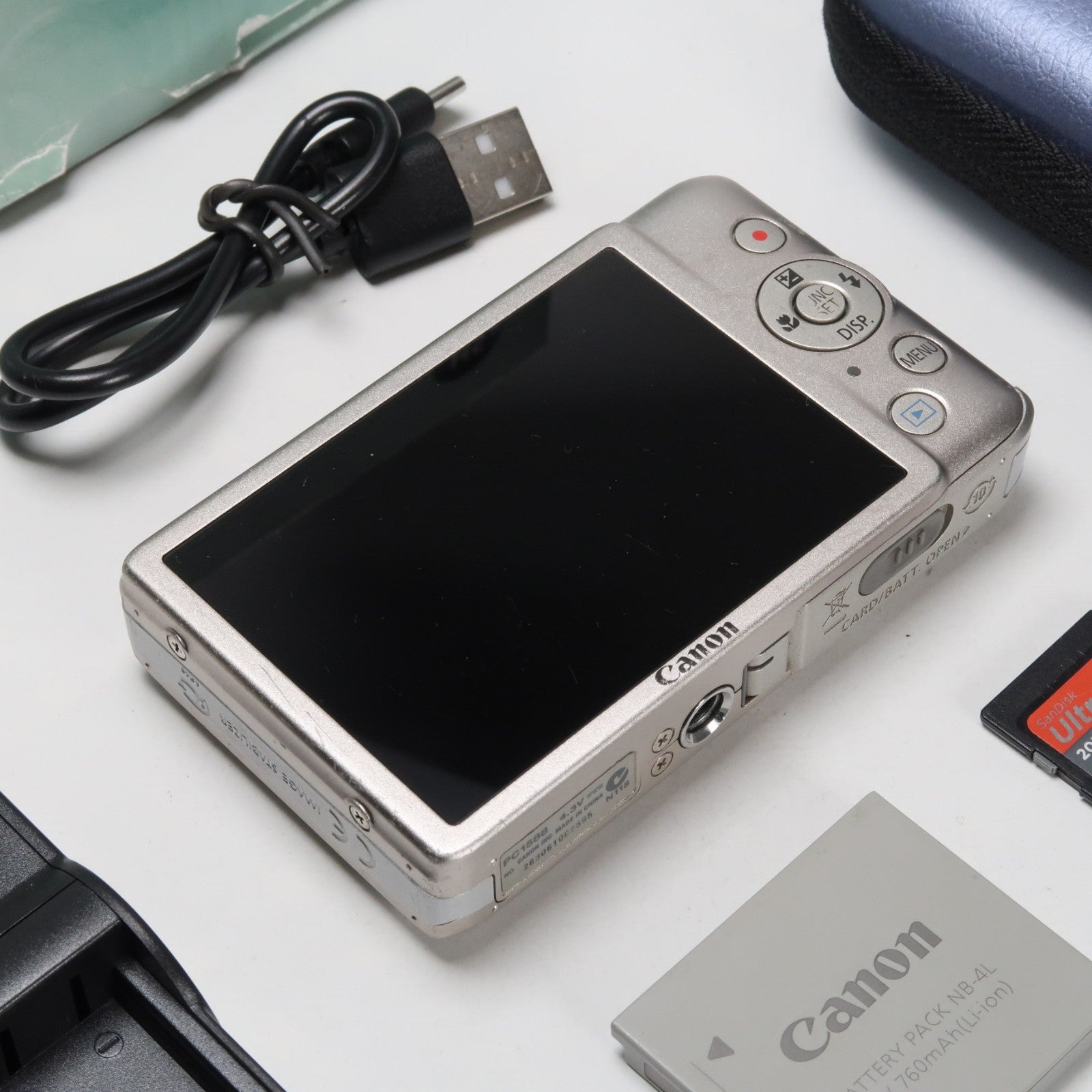 Canon IXUS 115 HS PowerShot ELPH 100 HS 12.1 MP 4x Digital Camera Silver